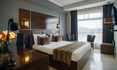 Cloud Hotel Standard Room — queen bed with modern furnishings, Parklands Nairobi